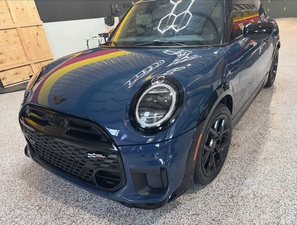 Blue Mini Cooper JCW with paint protection film at the West Haven shop